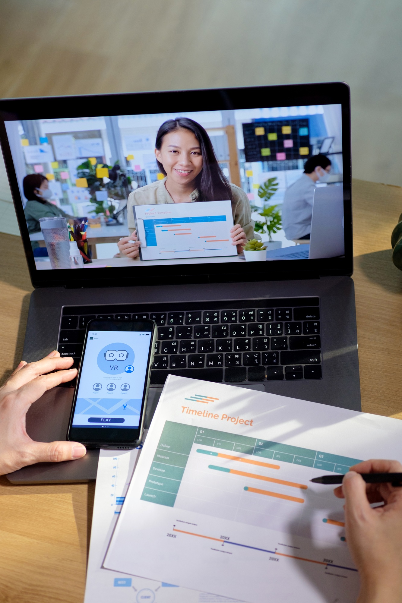 developer asisn woman video conference ux ui design meeting online with laptop at home